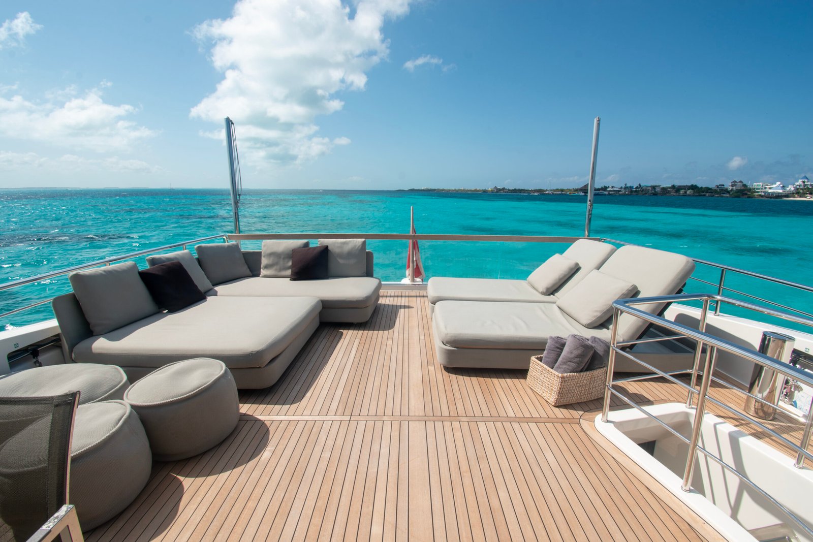 Luxury yacht deck overlooking the turquoise Caribbean Sea near Cancun