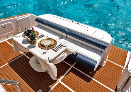 Outdoor lounge seating area on the Jackie 48ft yacht